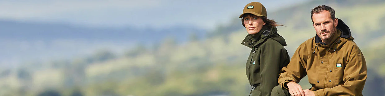 Man with waterproof jacket and hood up