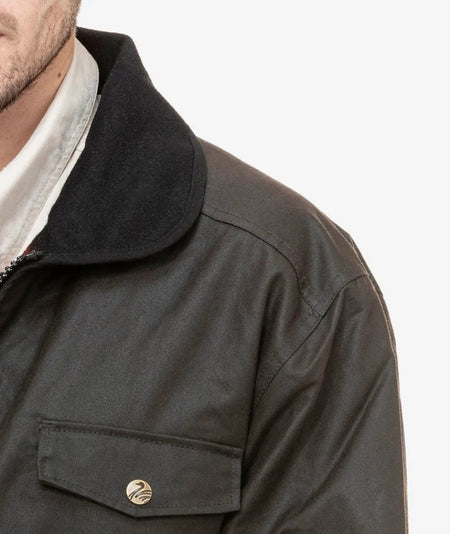 Swanndri Chocolate Waimak Wool Lined Oilskin Jacket Swanndri Oilskin Jackets are designed to keep our customers dry and warm in the toughest weather environments 100% Waxed Cotton OilskinWool Lined Body Fleece SleeveCoats & JacketsSwanndriMcCaskieSwanndri Chocolate Waimak Wool Lined Oilskin Jacket